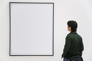 person looking at blank canvas